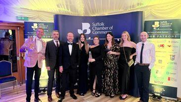 Aura Brand Solutions Team with the Presidents Award and Large Business of the Year
