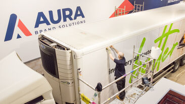 Aura Greencore trailer wrap -on stills